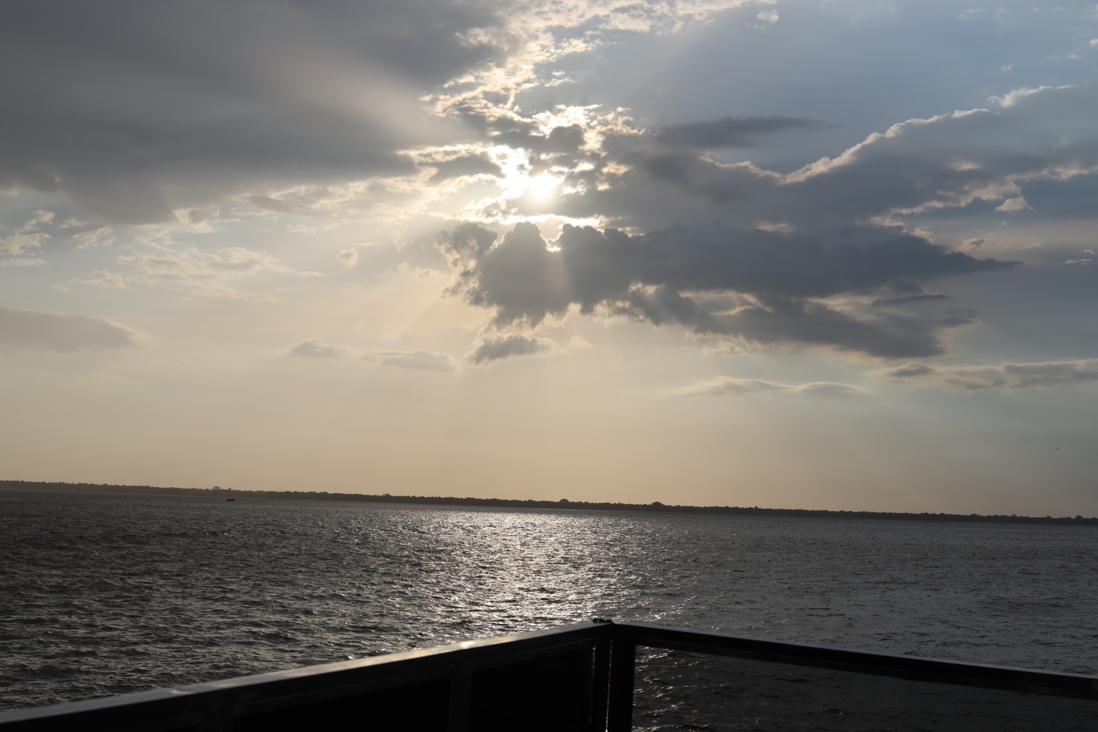 Sunset over the river during a Heavenlit event shoot in Belém